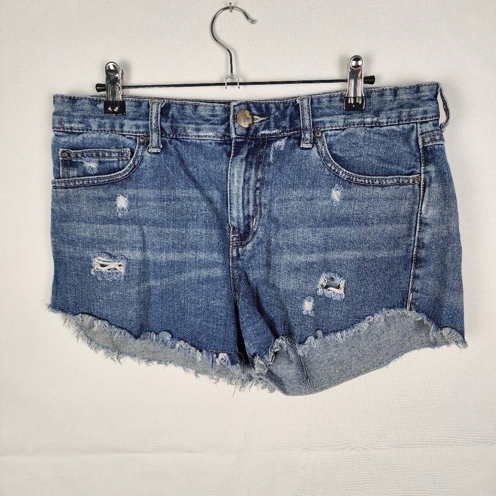 Free People Distressed Denim Cut Off Shorts Medium Wash Raw Hem W29